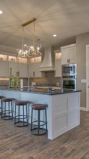 White kitchen island redesign with a woody floor